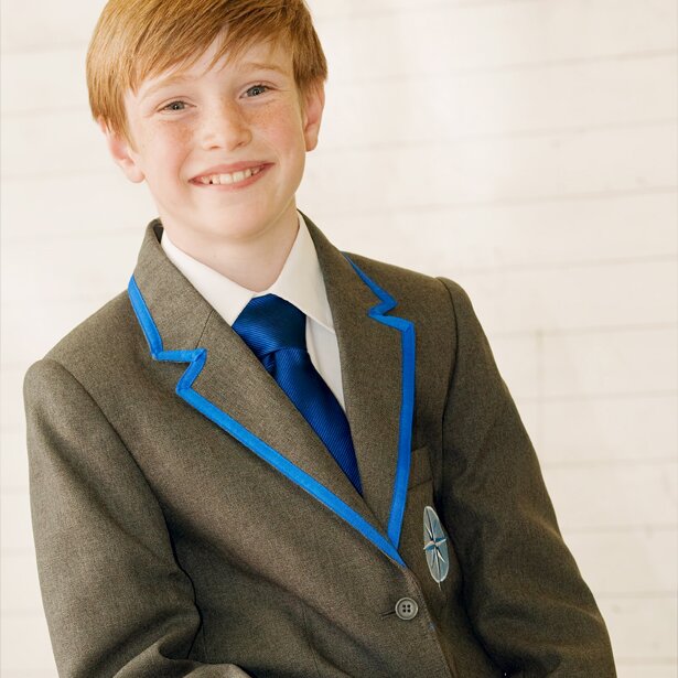 Picture of a boy demonstrating the GFS uniform